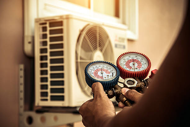 Professional Ac Installation technician working in Stone Mountain, GA